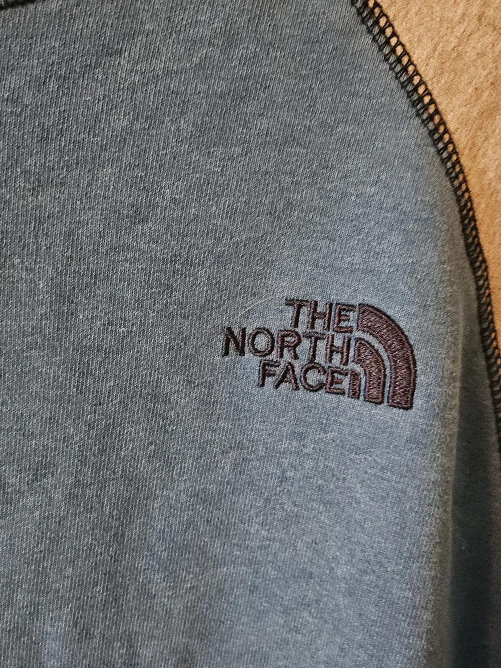 The North Face Blue Crewneck Sweatshirt with Gray Raglan Sleeves